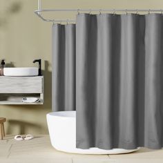 a gray shower curtain in a bathroom