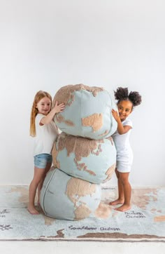 Tufted continents circling this pouf globe make an excellent geography lesson while relaxing with your feet up. 9.46 lb. Recycled PET bottles and polystyrene bead filling Cotton/other fibers Machine wash, tumble dry cover Imported Traveler Room, Map Rug, Kids Globe, Childcare Business, Girls Playroom, Lorena Canals, Earth Globe, Bean Bags, 자수 디자인