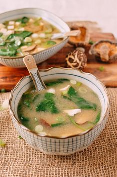 a close up of a bowl of soup on a table