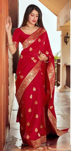 a woman in a red sari