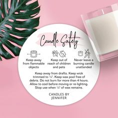 a candle that is next to a pink background with the words candle gaffy on it