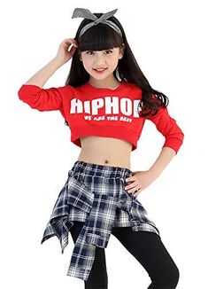 a girl in a red shirt and plaid skirt