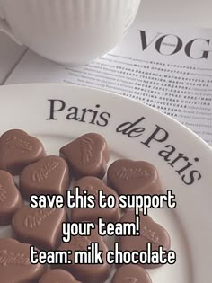 some chocolate hearts on a plate with the words save this to support your team milk chocolate