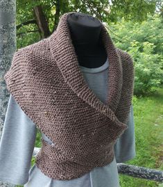 This Light brown  Heather Outlander Inspired Shawl is the perfect addition to any Outlander cosplay or costume. Hand knitted with attention to detail, it features a beautiful shoulder wrap design that will keep you warm and stylish. The chunky neck warmer and neck cowl add a touch of coziness, while the Outlander-inspired design adds a touch of authenticity. Made from high-quality materials, this shawl is the perfect accessory for any fan of the popular Outlander series. Whether you're attending a cosplay event or just looking for a unique and cozy accessory, this Gray Heather Outlander Inspired Shawl is a must-have. This chunky scarf is stylish, soft and comfy. The generous size allows you to wrap it several times around your neck or body, and there is a single button on one end to fasten Tweed Crochet, Outlander Shawl, Cosplay Cape, Cozy Accessories, Chunky Scarves, Knitted Shawls, Neck Warmer, Shawls And Wraps, Outlander