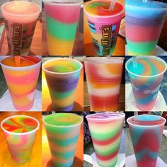 there are many different colored cups on the table