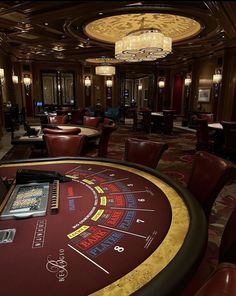 a casino table in a room with chairs and tables