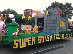 a parade float with people riding in it