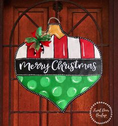 a christmas ornament hanging on a door