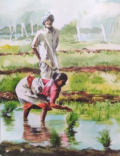 two people are standing in the water and one is bending over to pick up grass