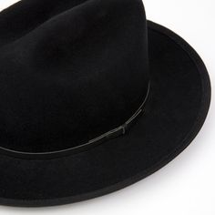 Our newest release is a hard wool style that also features a brand new crown shape. This Cattleman crown shape on our Field Fedora is a throwback to classic American headwear. A 2 3/4" flange up brim with brim binding. All leather is manufactured in a solar and wind powered facility that collects 27,300 tons of rainwater per year, and uses 50% natural light energy. Fit: Due to the stiff/firm nature of our hard wool, we recommend to check your head shape on our online fit guide below. The Field F Classic Curved Brim Fedora For Winter, Classic Winter Fedora With Curved Brim, Classic Brimmed Hat For Town, Classic Fedora Hat For Town, Classic Fedora With Flat Crown, Classic Wide Brim Felt Hat For Town, Classic Adjustable Fedora For Town, Classic Felt Hat With Curved Brim For Town, Classic Adjustable Felt Hat For Town