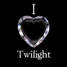 i heart twilight with the words twilight written in white on a black background and an image of a crystal heart