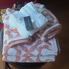 several folded towels are stacked on top of each other