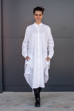 ➤ Features Length: front - 100 cm, back - 120 cm Blouse with collar Long sleeves Pockets on the sides Over the ankles cut Flared in the back Geometrical forms constructed in the cut ● The model is 5'6″ (168cm) tall ● The model is a S ➤ Sizing SIZE CHART (cm/inch) XS-bust 85/33.5, waist 66/26, hips 91/35.8 S-bust 90/35.5, waist 71/28, hips 97/38 M-bust 95/37.4, waist 76/30, hips 102/40 L-bust 102/40, waist 83/32.7, hips 109/43 XL-bust 109/43, waist 90/35.5, hips 116/45.5 2XL-bust 116/45.5, waist Linen Kimono, Boucle Coat, White Collared Shirt, Loose Shirts, Warm Coat, Oversized Cardigan, Spring Shirts, Collar Blouse, Kimono Dress