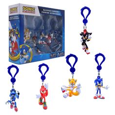 sonic the hedgehog keychains are shown in front of a box with other key chains