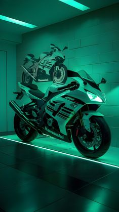 a motorcycle parked in a room with green lighting