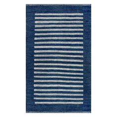 a blue rug with white stripes on it