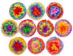 six colorful flowers arranged in the shape of a circle on top of each other,