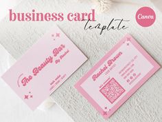 two pink business cards sitting next to each other on a white surface with the words, business card template