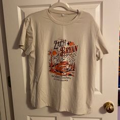 Nwot Zach Bryan Something In The Orange Tan Tee Shirt Size Xl Zach Bryan T Shirt, Zach Bryan Shirt, Something In The Orange, Baggy Shirts, Stop And Shop, Xmas 2024, Zach Bryan, Bday Ideas, Go Shopping