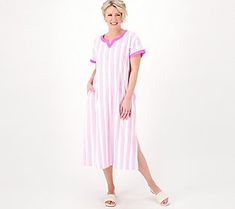 The caftan: summer's favorite silhouette. Fluid and feminine, this warm-weather staple flatters every figure with its easy, breezy nature. Throw it on over your swimsuit as an upscale cover-up, pair it with bold bangles and statement earrings when you take it out for brunch, or wear it around the house on those relaxed weekends. This caftan isn't just a style -- it's a lifestyle. From Stan Herman. Spring V-neck Beach Dress, Short Sleeve Beachwear Cover-up For Daywear, V-neck Beach Sleepwear For Summer, Summer V-neck Beach Dress For Loungewear, Summer V-neck Beach Dress Loungewear, V-neck Summer Beach Dress For Loungewear, Summer Loungewear Cover-up, Relaxed Fit Beach Dress For Summer Loungewear, Summer Beach Dress With Relaxed Fit For Loungewear