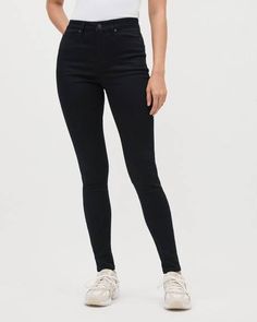 A timeless piece, these stretch black jeggings are definitely an essential piece to add to your wardrobe. Blending the comfort of a legging with the look of a skinny jean.  Fit & Cut - Skinny leg - High-rise - 32'' inseam (size M)  Design Details - Stretch fabric mix: contains 27% of REPREVE(R) TruTemp365 polyester* - Front zipper closure - 5 pockets  * REPREVE(R)TruTemp365 polyester made of recycled plastic bottles. Its moisture wicking quality keeps the wearer cool and dry in the heat, warm an Black Fitted Elastane Jeggings, Non-stretch High Rise Jeggings, Black Fitted Mid-rise Jeggings, Black Mid-rise Stretch Jeggings, Black Non-stretch Mid-rise Jeggings, Yoga Jeans, Black Jeggings, Slim Fit Dress Shirts, Jean Jeggings