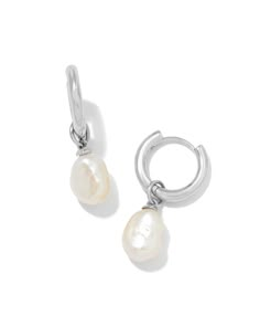 Classy and chic, we’re obsessed with the Willa Silver Pearl Huggie Earrings in White Pearl—and you will be, too! A dainty cultured freshwater pearl dangles from a petite huggie for a lightweight style you’ll pair back with any stack. Metal Rhodium Over Brass Material White Pearl Closure Ear Post Size 1.8" Outside Diameter, 0.4"L X 0.3"W CharmDue to the one-of-a-kind nature of the medium, exact colors and patterns may vary slightly from the image shown. | Kendra Scott Willa Silver Pearl Huggie Ea Silver Pearl Teardrop Earrings, Silver Kendra Scott Earrings, Silver Classy Earrings, Silver Pearl Wedding Jewelry, Kendra Scott Silver Earrings, Hoco Earrings Silver, Country Jewelry Earrings, Chain Earrings Silver, Trendy Jewelry Silver