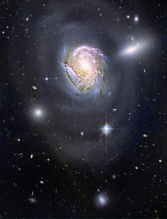 an image of a spiral galaxy in the sky