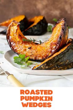 roasted pumpkin wedges on a plate with the title above it that reads roasted pumpkin wedges