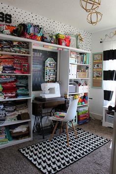 the sewing room is clean and ready for someone to sew or do something else