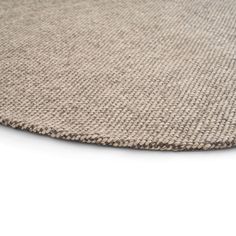 The Bila Round Rug is handwoven in India with a blend of viscose and wool. The rug makes a great companion for round dining tables.

Light Grey available in two sizes available: 6' and 8'
Dark Grey only available in 6'
handwoven
Made in India