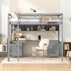 a loft bed with desk underneath it in a room that has white walls and wood floors