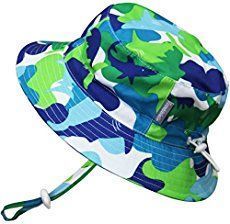 a blue and green camouflage print hat with a white string attached to the brim