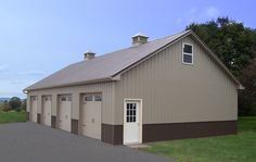 a large garage with two doors on the side