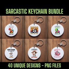 six keychains with different designs and sayings for sale on wooden boards,