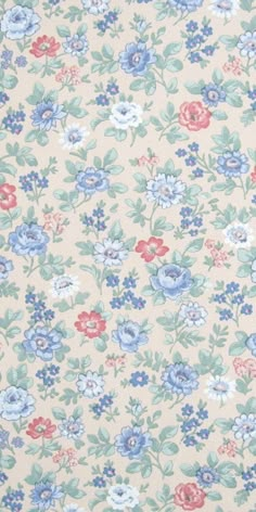 a floral print fabric with blue, pink and white flowers on it's side