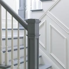 the stairs are painted white and gray