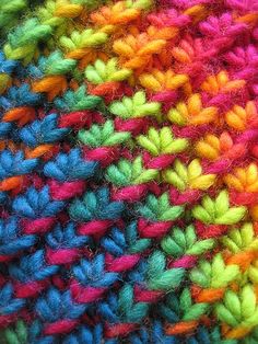 multicolored crocheted wool fabric close up