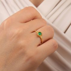 ➤ Ring Details * 14K / 18K Yellow Gold or Yellow Sterling Silver * Gold Color Options; 14K / 18K White, Yellow, Rose Gold * Sterling Silver Color Options; Yellow, Rose, White * Band Width: 1.50mm * Thickness: 1.70 mm ➤ Gem Details * Gemstone 1 : Emerald * Gem width: 4 millimeter * Gem length: 4 millimeter * Cut Type: Round * Ready to Ship 3-5 Business Days 💍 ISEA Jewels' pieces are handcrafted by 10-15 years of experienced craftsmen and made to order in a very short time. 🎁 All pieces come in a quality and hygienic suede gift box enclosed in a pouch. 🌎 Our products arrive worldwide within 6 working days. ❓ Questions, comments, or just want to say hi? We are glad to hear from our customers and are always quick to respond. Reviews are always appreciated ✨ 💫 Find out more about my shop at May Birthstone Diamond Ring, Diamond Cut For Gift, Yellow Gold Emerald Signet Ring Gift, Yellow Gold Octagon Rings For Gift, Gold Rings Emerald Cut For Gift, Yellow Gold Octagonal Rings For Gifts, Octagon Yellow Gold Rings For Gift, Emerald Cut Gold Rings For Gift, Yellow Gold Rings For Proposal With Round Band, Yellow Gold Birthstone Ring For Proposal