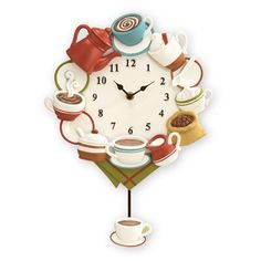 a clock with coffee cups and saucers on it's face is shown in this image