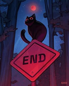 a black cat sitting on top of a red end sign