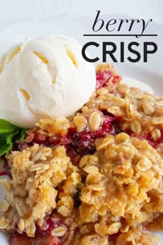 a close up of a plate of food with berries and ice cream on top that says berry crisp