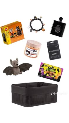 an assortment of halloween items including a bat, bracelets and other items are shown