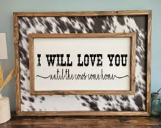 a framed sign that says i will love you and the words are written on it