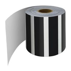 a roll of black and white striped paper