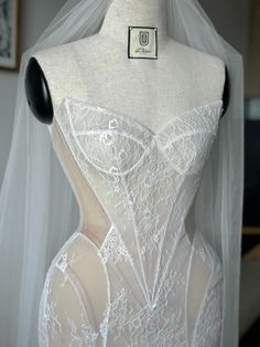 the back of a wedding dress on display