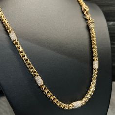 Discover the epitome of luxury with our UNRIVALED 10 carat diamond-paved, diamond-cut Franco chain, meticulously crafted with an upgraded diamond version of our Signature Lion & Snake Clasp. This 6mm men’s gold chain features nine pave’-diamond stations, pave’-diamond collars, and dazzling diamonds set in the lions’ eyes on the two lion head end caps. Stamped with the quality hallmark, this Franco chain guarantees exceptional craftsmanship and durability. Its diamond-cut design adds a captivatin Gold Diamond Chains For Men, Gold And Platinum Chain For Men, Men’s Gold Chain, Gold Neck Chains For Men, Gold Chain Design For Men, Lions Eyes, Mens Neck Chains, Men Gold Chain, Neck Chain For Men