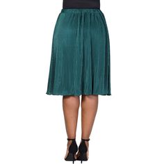 This elegant plus size skirt features a rich and luxurious shimmering pleated accordion fabric that adds texture and movement to your outfit. Designed with an elastic waistband, it provides a comfortable and flexible fit for various body types. The skirt is double layered, ensuring complete coverage and eliminating the need for additional undergarments. Its midi length is versatile, making it suitable for both casual and formal occasions. The flowing A Line silhouette enhances its sophisticated Green Midi Pleated Skirt For Party, Chic Green Knee-length Pleated Skirt, Elegant Green Flared Mini Skirt, Elegant Green Mini Skirt For Fall, Knee-length Pleated Mini Skirt For Party, Green Pleated Party Bottoms, Elegant Green Pleated Lined Skirt, Elegant Green Lined Pleated Skirt, Green Pleated Bottoms For Party