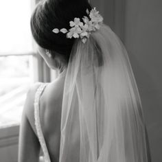 the back of a bride's head wearing a veil