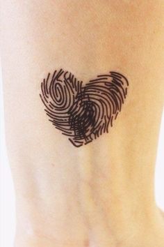 a heart shaped finger print on the ankle