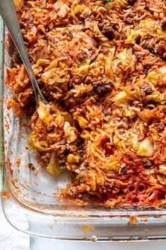 a casserole dish with meat and vegetables in it, ready to be eaten